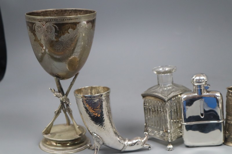An Edwardian silver mounted hip flask, 11.4cm, a similar cornucopia vase and four other items including plated trophy cup.